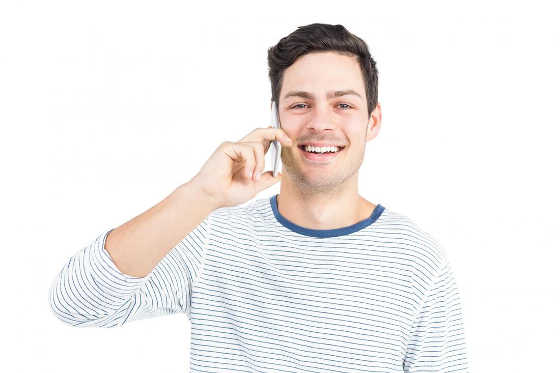 man happily taking call